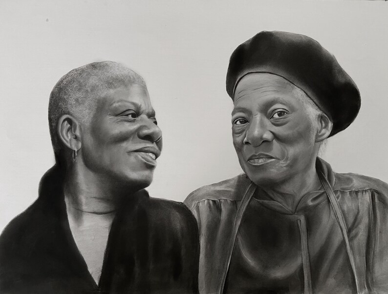 May include: A black and white portrait of two women. One woman is smiling, wearing a dark top and a small hoop earring. The other woman is wearing a beret and a dark top, looking directly at the viewer.