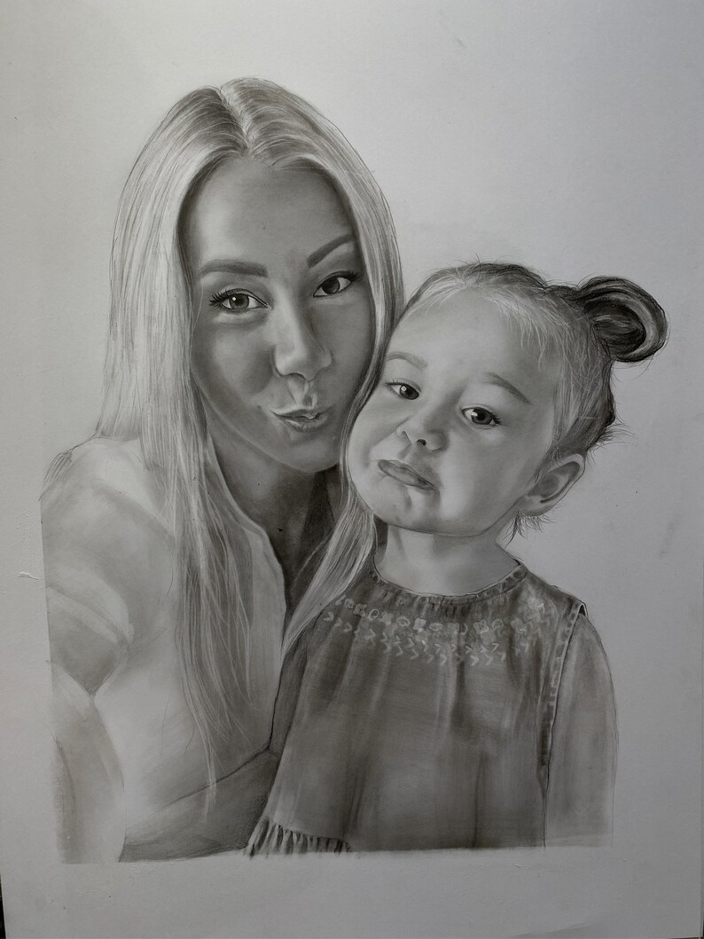 May include: Pencil drawing of a woman and a young child. The woman has long blonde hair and is puckering her lips. The child has a bun hairstyle and is making a funny face. The drawing is in grayscale.