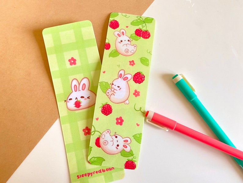 Springtime Bunnies and Raspberries green laminated double sided bookmark image 1