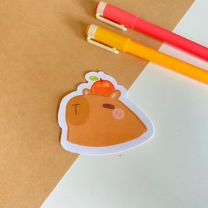 Capybara with an orange on its head sticker | Laminated die-cut stickers | journal | laptop sticker | planner | unique | cute | animal