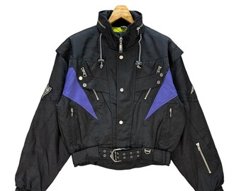 Vintage ELLESSE Ski Jacket: Italy Made Black Snowboarding Jacket (Size M)