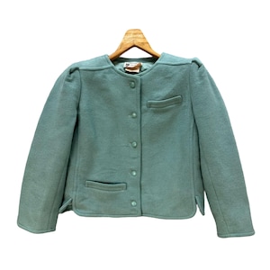 May include: A light blue blazer with a button-up front and two pockets. The blazer has a slightly puffed shoulder design.