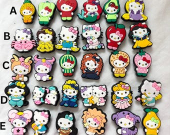 May include: A selection of vibrant shoe charms, each depicting Hello Kitty in diverse guises. The charms are designed as fruits, vegetables, and other characters. The charms are made of a glossy material.