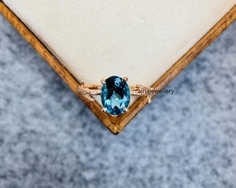 London Blue Topaz Ring: Rose Gold Plated 925 Sterling Silver