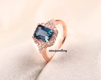 Handmade London Blue Topaz Ring: Rosegold Sterling Silver, Cubic Zirconia