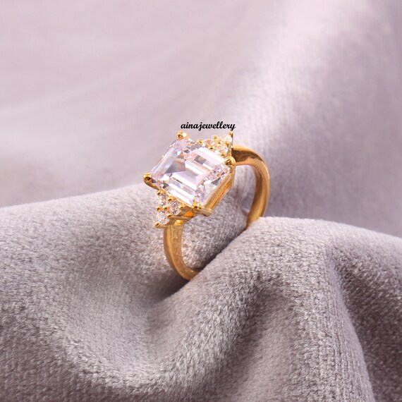 Octagon Shape Pave Cubic Zirconia Ring with Square CZ Center Rhodium on Silver Octagon Shape Pave Cubic Zirconia Ring with Square CZ Center Rhodium on Silver