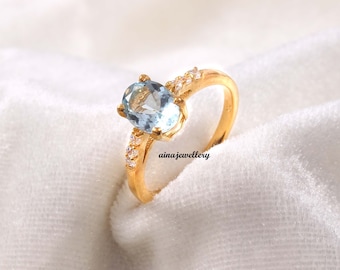 Oval Aquamarine Ring: 925 Sterling Silver, CZ Accents