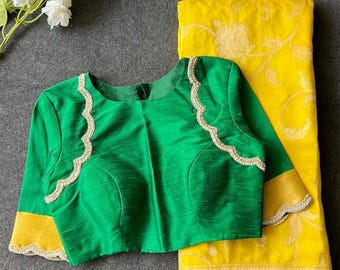 Gele Banarasi-sari met groene zijden blouse met handborduurwerk.