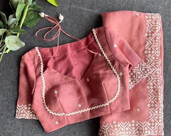 Peach tissue saree with tissue embroidery blouse