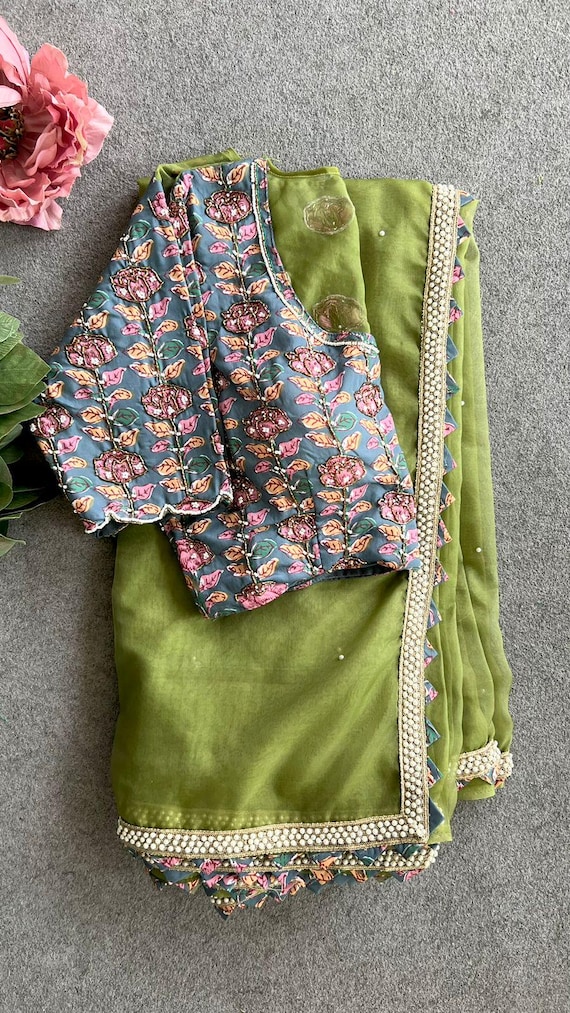 Green soft organza saree with cotton handwork blouse