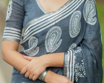 Grey linen floral saree with hand work blouse