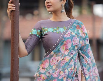 Blue floral georgette saree with grey embroidery blouse