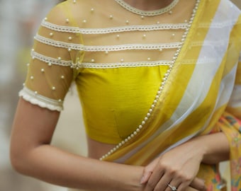 Fenugreek organza saree with hand work blouse