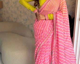 Pink lehariya saree with green hakoba embroidery blouse