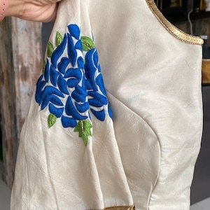 Half White threaded floral hand work blouse