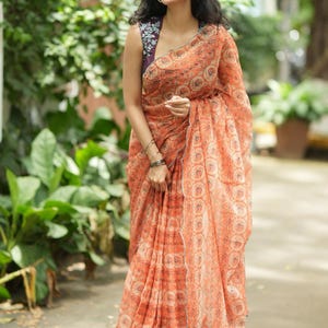 Pastel peach chiffon saree with brown hand work blouse image 7