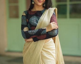 Cream malai chanderi saree with Ajrak handblock print blouse