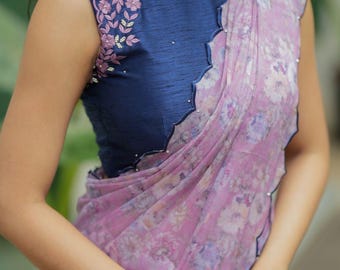 Lavender chiffon saree with blue hand work blouse