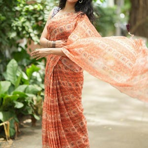 Pastel peach chiffon saree with brown hand work blouse image 6