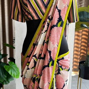 Soft Blush Muslin Stripes Saree with Smocking main image 1