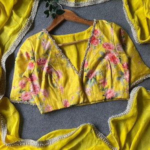 Yellow jute saree with pearl hand worked blouse