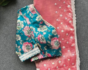 Peach soft glass tissue saree with green floral embroidery blouse