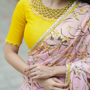 Peach georgette saree with silk hand work blouse