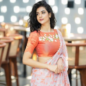 Liliac chiffon saree with tissue hand work blouse