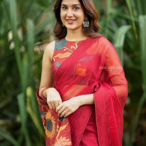 Maroon soft organza saree with kalamkari blouse