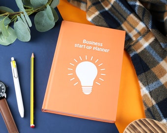 Start up business guide workbook | Start your own business | Undated planner Daily Planner A5 Hardcover - Orange