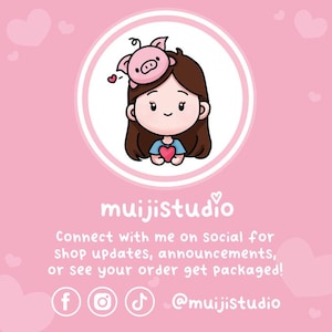 May include: A pink and white illustration of a cartoon character with a pig on their head. The character is holding a red heart. The text "muijistudio" is below the character. The text "Connect with me on social for shop updates, announcements, or see your order get packaged!" is below the text "muijistudio". The text "f@muijistudio" is below the text.