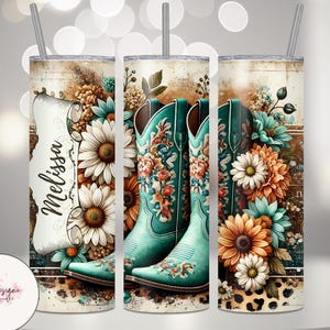 May include: A personalized tumbler featuring a turquoise cowboy boot design with floral accents. The design includes sunflowers, daisies, and the name "Melissa" on a decorative label. The tumbler has a straw.