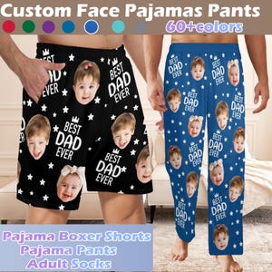 May include: Custom pajama boxer shorts and long pants featuring a repeating pattern of a baby's face, white stars, and the text "BEST DAD EVER". The shorts are black and the pants are blue. The image includes text reading "Custom Face Pajamas Pants" and "60+colors".