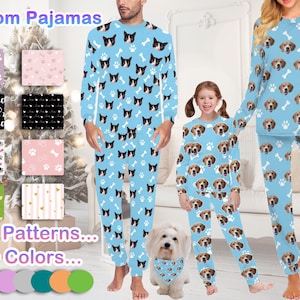 May include: A family of three wearing matching blue pajamas with a dog face pattern. The pajamas have white paw prints and bone designs. The text "Custom Pajamas" is at the top of the image. Below the image are swatches of different colors and patterns.