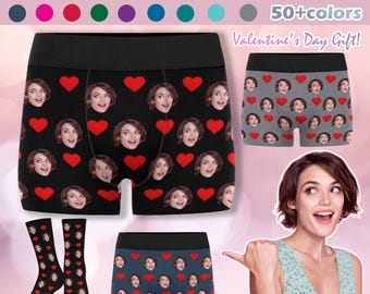 May include: Custom face boxer shorts and socks with a heart pattern. The boxer shorts are black with red hearts and the socks are black with white hearts. The text "50+colors" and "Valentine's Day Gift!" is visible in the image.