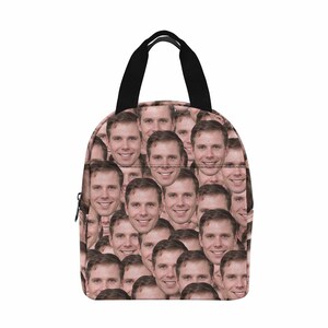 May include: A black and pink backpack with a pattern of a person's face repeated all over the surface.