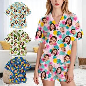 May include: A collection of personalized pajama sets and short-sleeved shirts. The shirts feature custom faces on various patterns, including eggs, avocados, bananas, and tropical designs with pineapples and flowers. The pajama set is pink.