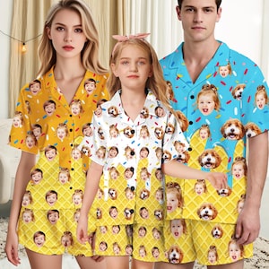 May include: Matching pajama sets in yellow, white, and blue. The sets feature a waffle cone design with faces and sprinkles. The yellow set has a button-down shirt and shorts. The white set has a button-down shirt and shorts. The blue set has a button-down shirt and shorts.