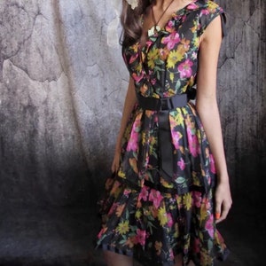 Vintage original 1960s black floral party dress with beautiful detail. Fully lined. Back zip fastening UK 8 10.