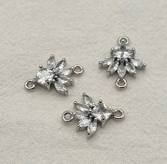 Surgical Steel Clear Paved CZ Flower with Center Stone Surgical Steel Clear Paved CZ Flower with Center Stone