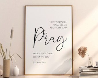 May include: A white framed print with a black and white abstract background. The text "THEN YOU WILL CALL ON ME AND COME AND Pray TO ME, AND I WILL LISTEN TO YOU JEREMIAH 29:12" is printed on the print.