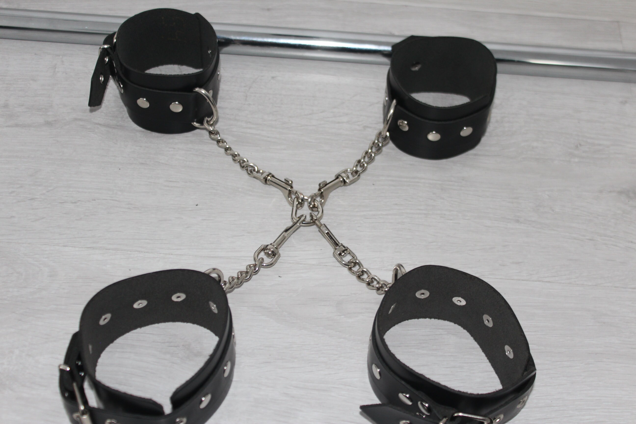 bondage BDSM cross BDSM pillory whip stocks enslavement leather handcuffs