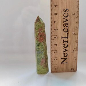 May include: A set of three ceramic mugs with a speckled, matte finish. Each mug features a different color: light blue, cream, and gray. The mugs have a simple, modern design and a comfortable handle.