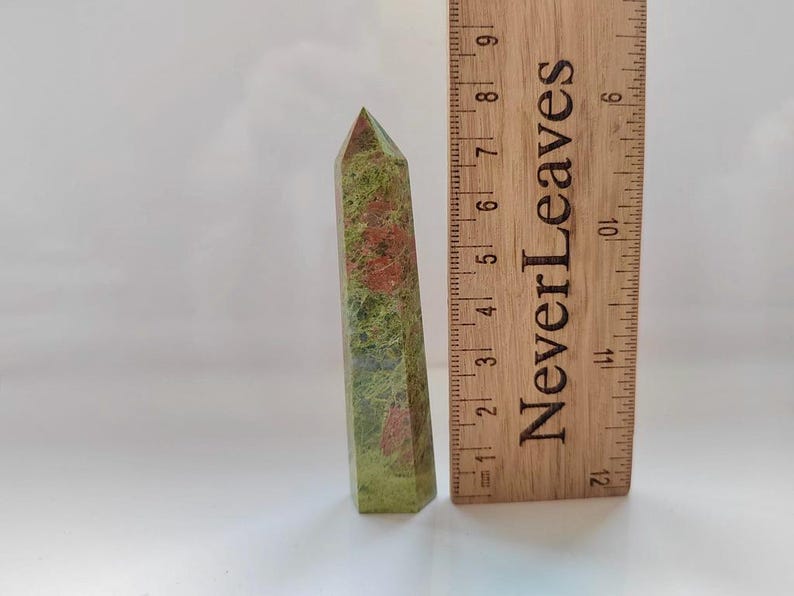 May include: A set of three ceramic mugs with a speckled, matte finish. Each mug features a different color: light blue, cream, and gray. The mugs have a simple, modern design and a comfortable handle.