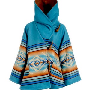 beth's blue poncho on yellowstone