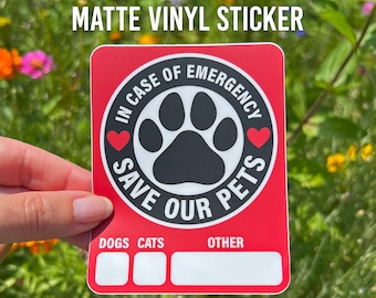 May include: Red and black matte vinyl sticker with the text "In Case of Emergency Save Our Pets" in a circle with a paw print and two hearts. The sticker has three blank boxes labeled "Dogs", "Cats", and "Other".