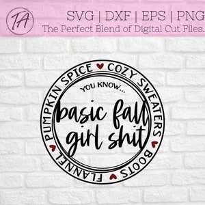 May include: Black and white circle design with the text "Pumpkin Spice, Cozy Sweaters, Boots, Flannel, You Know... Basic Fall Girl Shit" in a handwritten font.