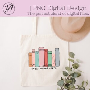 May include: A white tote bag with a design of colorful books stacked on top of each other. The text "fully booked, sorry." is printed below the books.
