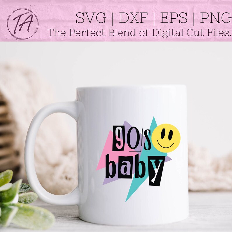 May include: White ceramic mug with a graphic design featuring the text "90's baby" in black and white with a yellow smiley face. The text is surrounded by colorful geometric shapes.