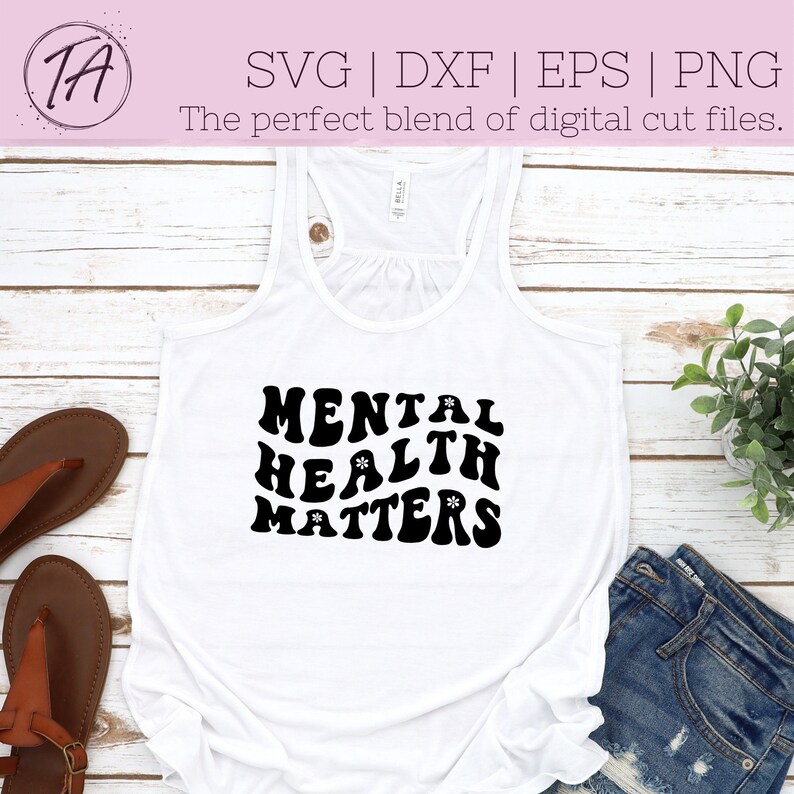 May include: White tank top with black text that reads "MENTAL HEALTH MATTERS" in a retro font with small flower accents.